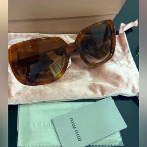 Miu Miu Tortoise Sunglasses